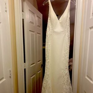 Beautiful wedding dress with a lovely train.